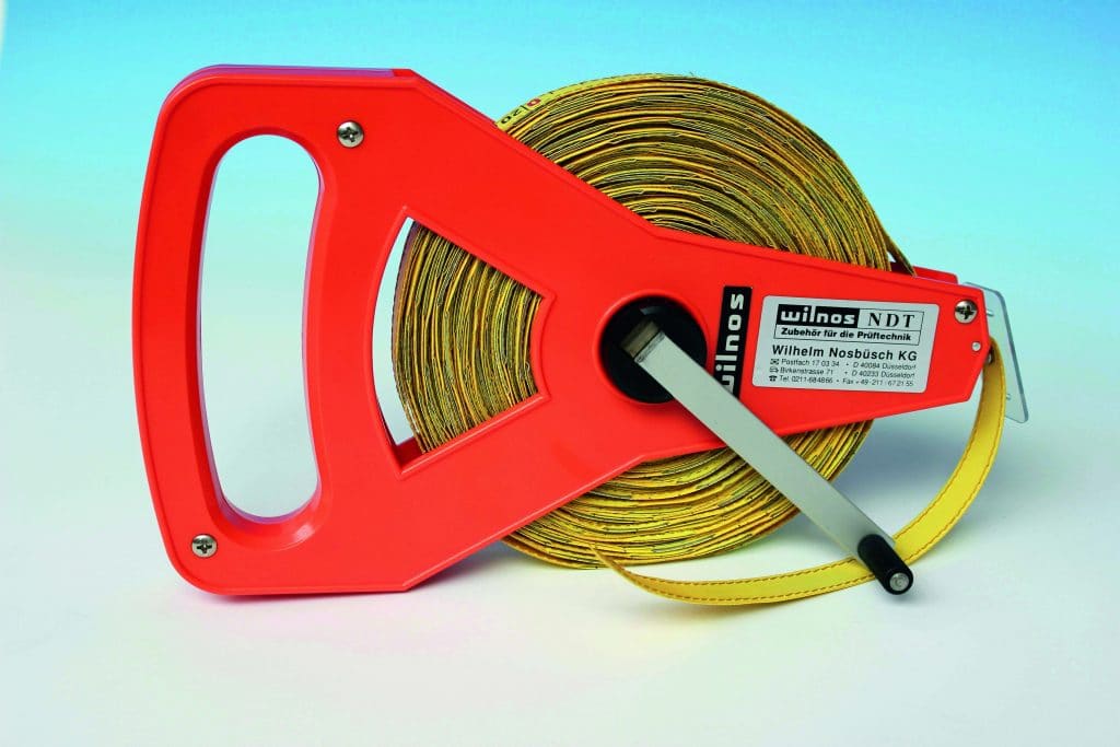 Reel for very long marker tapes (III), including buckle for tape, for